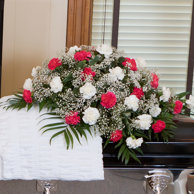 Carnation Classic Casket Spray from Casey's Garden Shop & Florist, Bloomington Flower Shop